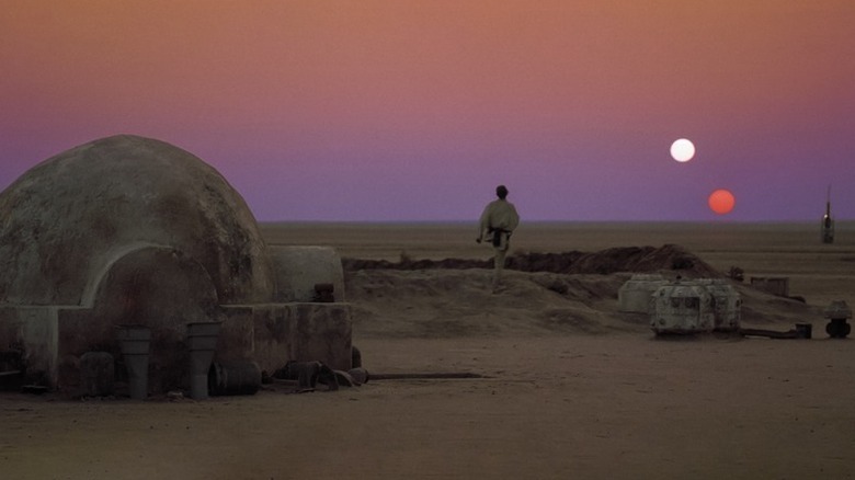 Star Wars (1977) -- Luke on Tatooine looking out at the sunset