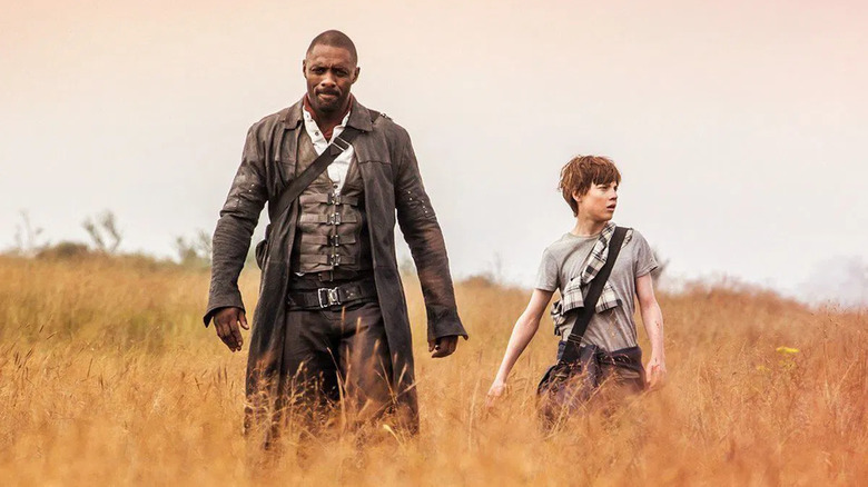 Roland and Jake walking in a field in The Dark Tower