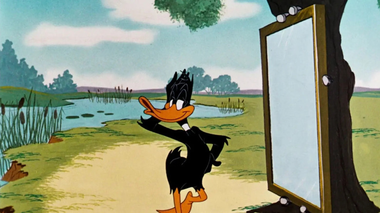 Daffy Duck posing in front of a mirror in What Makes Daffy Duck