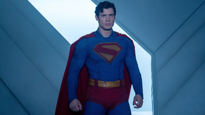David Corenswet as Superman standing in the entrance of his Fortress of Solitude looking up in Superman (2025)