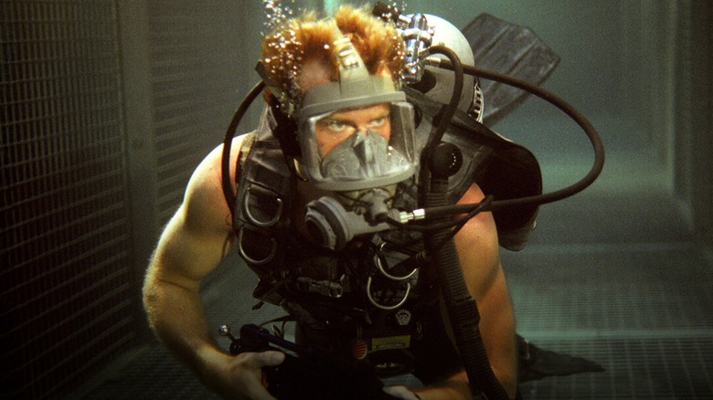 Carter Blake hunts the killer shark in full nautical gear in Deep Blue Sea