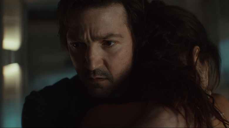 Cassian hugs Bix in Andor