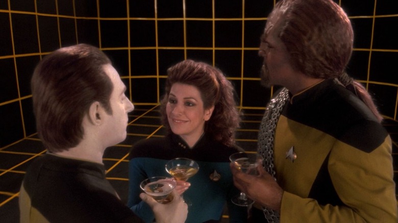 Data, Troi, and Worf enjoing some champagne on the holodeck on Star Trek: The Next Generation