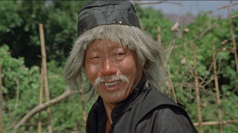 drunken master yuen siu-tien smiles knowingly