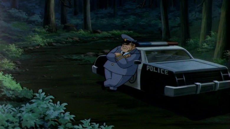 Sergeant Cosgrove out in the woods by his car in Freakazoid!