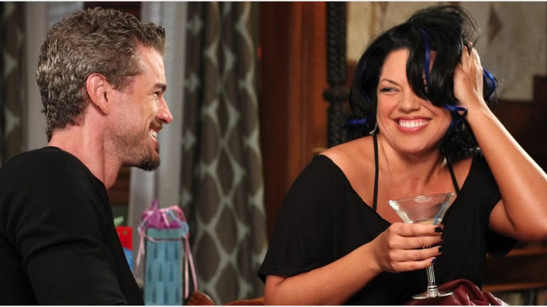 Callie laughing with a cocktail and Mark on Grey's Anatomy