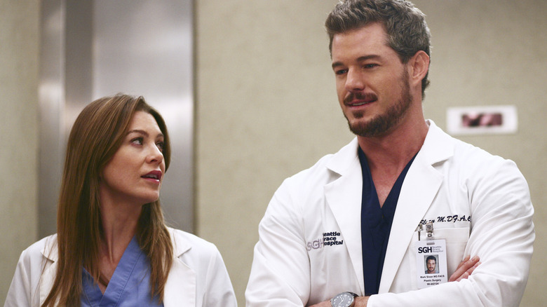Meredith and Mark talking in the elevator on Grey's Anatomy