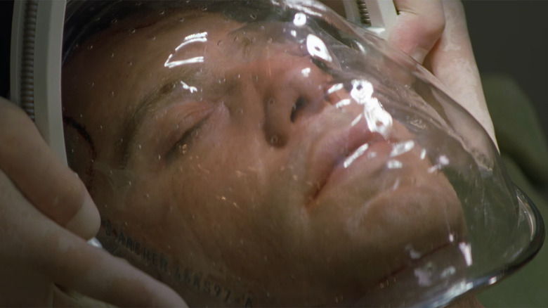 John Travolta as Sean Archer having his face taken off in surgery in Face/Off