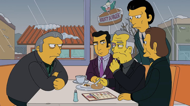 Fat Tony (Joe Mantegna) and his goons meet with Kostas Becker (Brian Cox) on The Simpsons