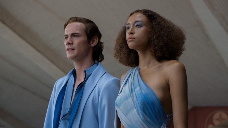 Brother Dawn and Queen Sareth wearing blue clothing in Foundation