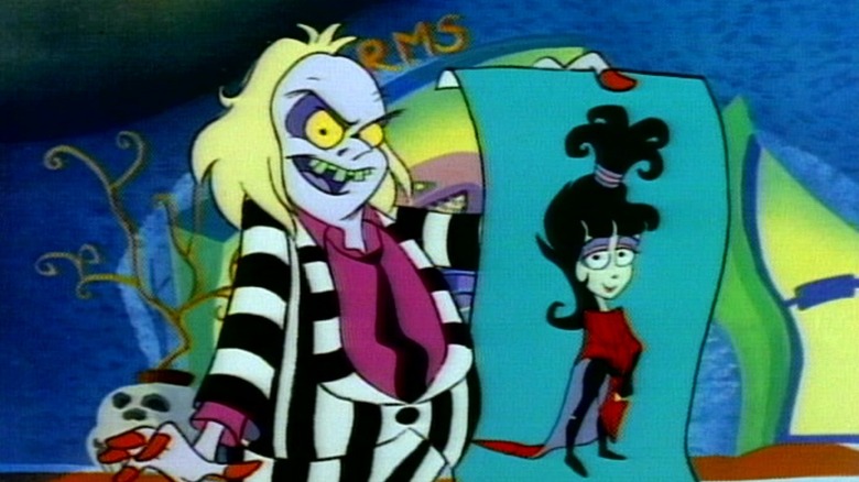 Beetlejuice holding a poster of Lydia in Beetlejuice