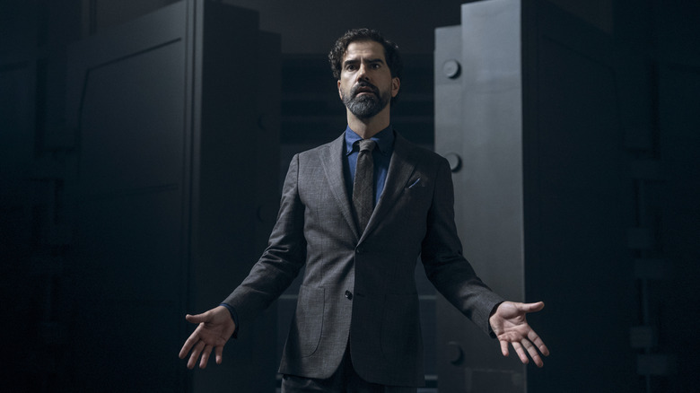 Hamish Linklater's Dean Cipher wearing a suit and tie on Gen V