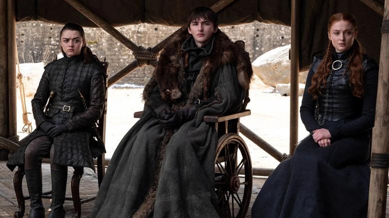 Maisie Williams as Arya, Isaac Hempstead Wright as Bran, and Sophie Turner as Sansa on Game of Thrones