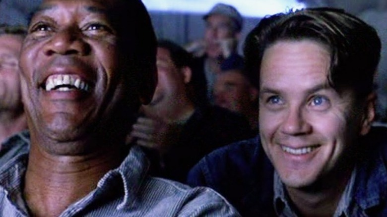 Red and Andy smiling audience