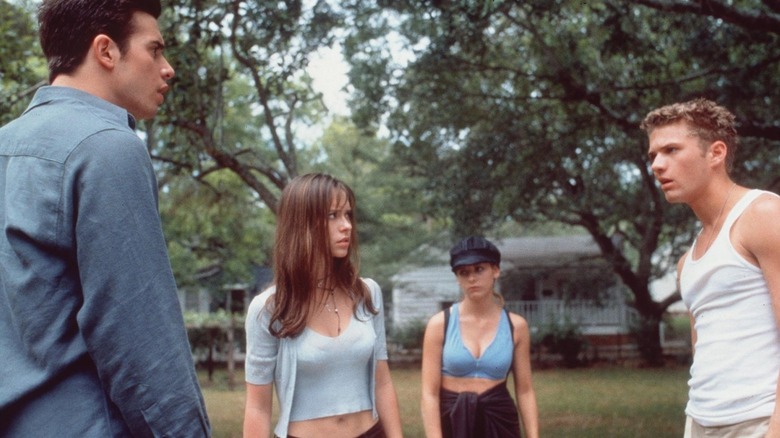 Ray, Julie, Helen, and Barry standing outdoor, looking at each other angrily in I Know What You Did Last Summer