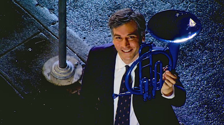 Ted holding the blue french horn in the second half of Last Forever on How I Met Your Mother