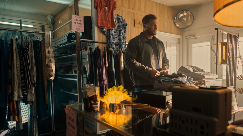 Ritcher being a thrifting king while buying one outfit change in Season 2 of Reacher