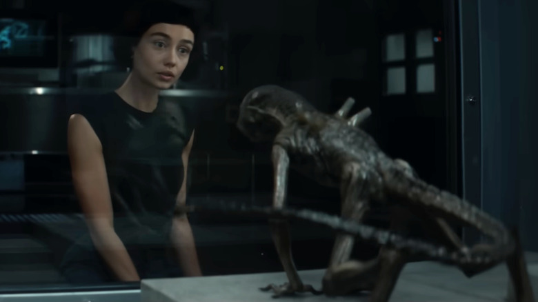 Sydney Chandler as Wendy looking at a Xenomorph in Alien: Earth