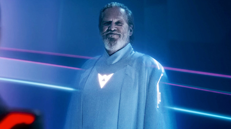 Jeff Bridges' Kevin Flynn stands smiling in digital form in Tron Ares
