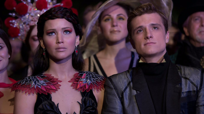 Katniss and Peeta dressed up in the Capitol in The Hunger Games: Catching Fire