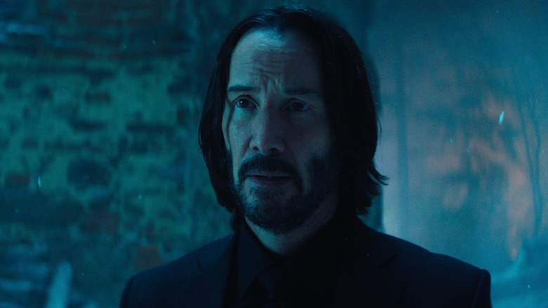 Keanu Reeves as John Wick looking regretful in Ballerina
