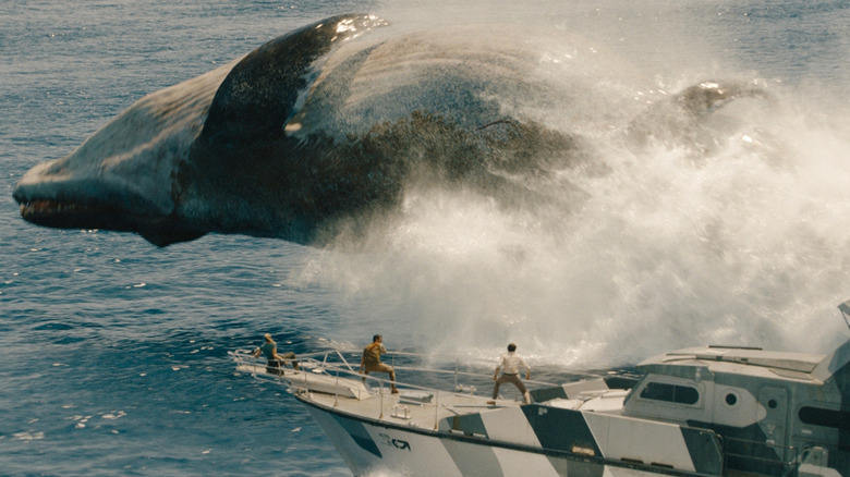 The Mosasaurus popping out of the water near the boat in Jurassic World Rebirth