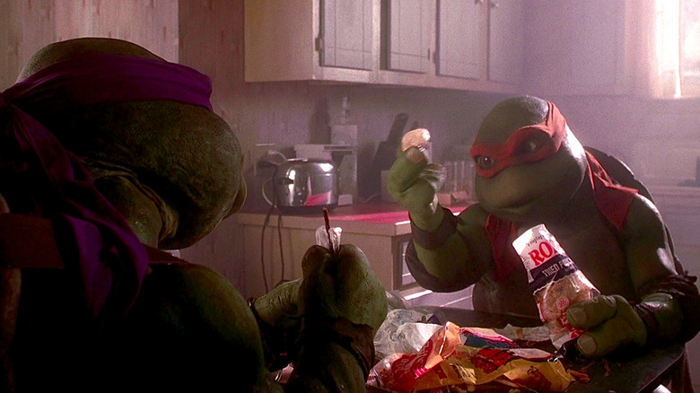 Michelan Sisti offers Leif Tilden a chip in Teenage Mutant Ninja Turtles