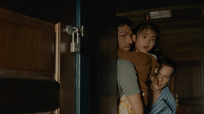 Ben Aldridge, Kristen Cui, and Jonathan Groff in Knock at the Cabin