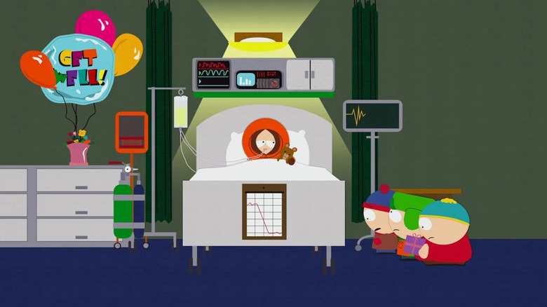 Kenny in bed dying, being visited by Stan, Kyle, and Cartman on "South Park."