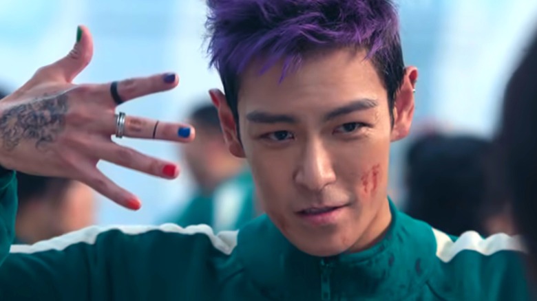 Choi Seung-hyun as Thanos in Squid Game