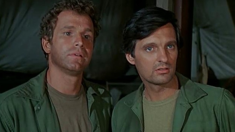 Wayne Rogers and Alan Alda in M*A*S*H