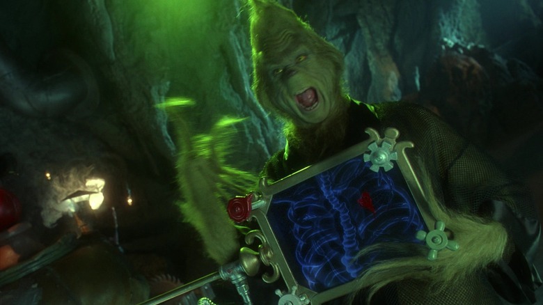 how the grinch stole christmas grinch holds x ray over heart