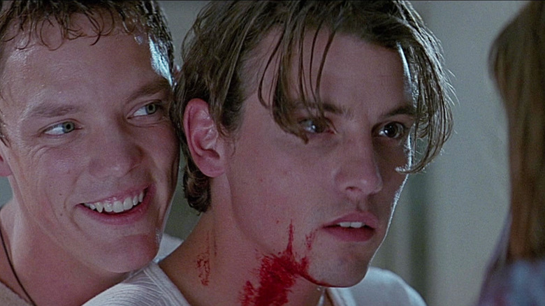 Matthew Lillalard when Strah Marech smiles behind the bloody skate of Ulrich, as Billy Lumis in Scream (1996)