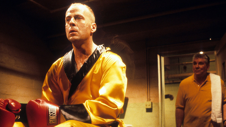 Bruce Willis sports a robe and boxing gloves as Butch Coolidge in Pulp Fiction