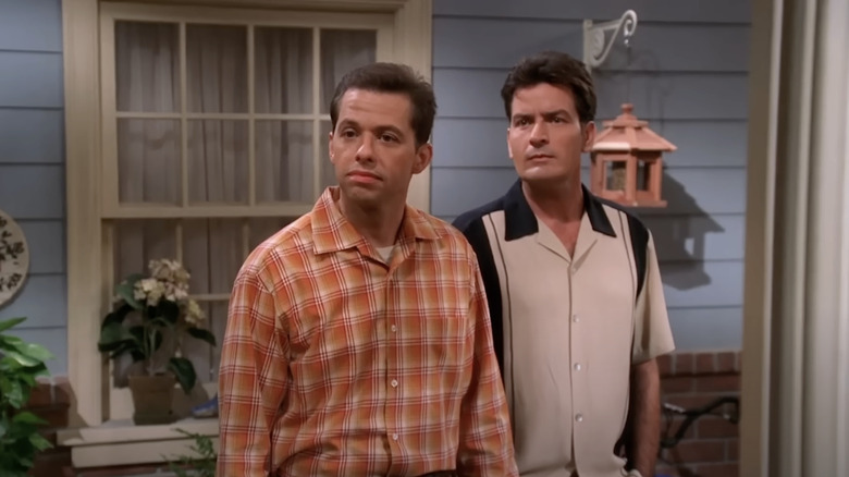Alan and Harper standing together outside in Two and a Half Men