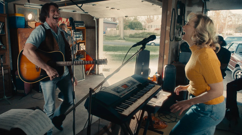 Mike and Claire rehearse in their garage in Song Sung Blue