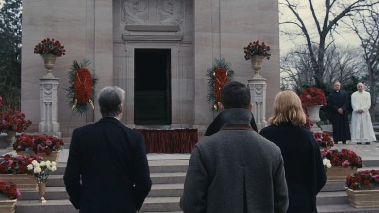 Alan Ruck as Connor Roy, Jeremy Strong as Kendall Roy, and Sarah Snook as Shiv Roy visit their father's mausoleum in the Succession episode Church and State