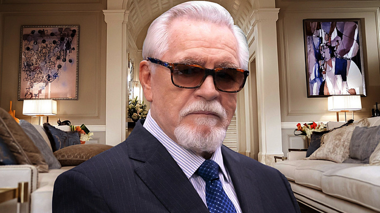 Brian Cox as Logan Roy from Succession wearing sunglasses in his penthouse apartment