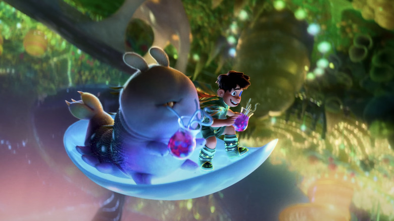 Ellio and Glordon flies over the lush disk from Communiverse