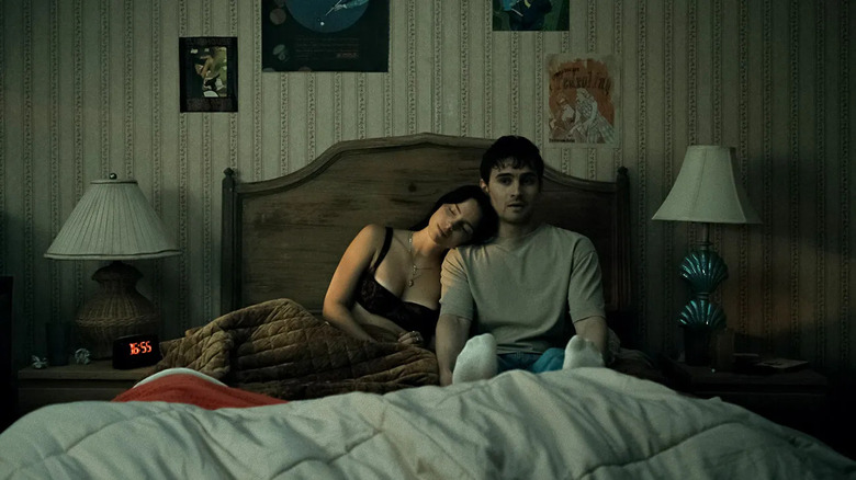 Nikki cuddles up with a haunted Bear in Obsession