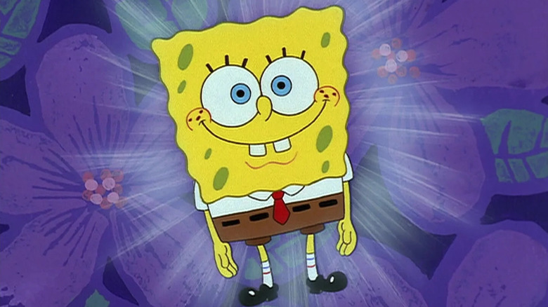SpongeBob looking happy against a blue background in SpongeBob SquarePants