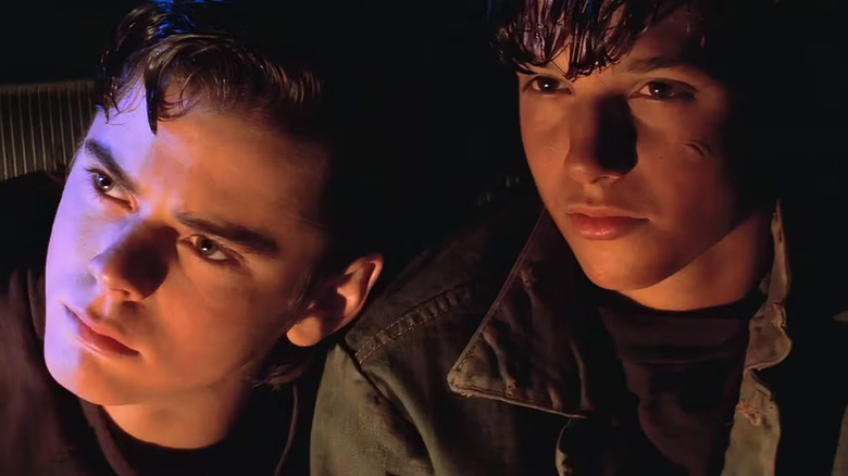 C. Thomas Howell as Ponyboy Curtis and Ralph Macchio as Johnny Cade in The Outsiders