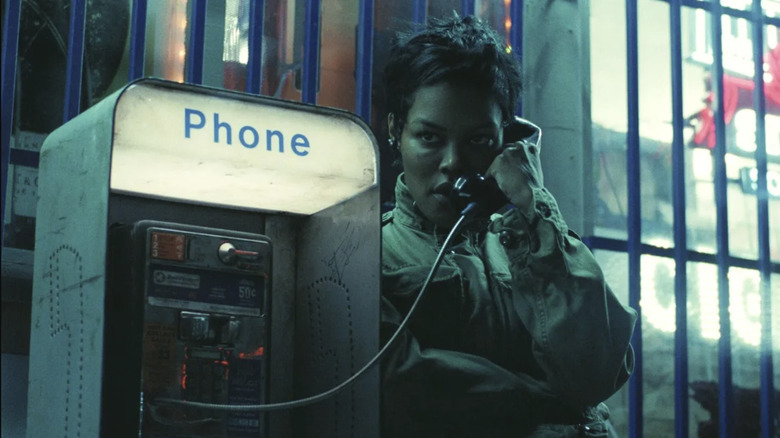 Teyana Taylor as Perfidia Beverly Hills on a payphone in One Battle After Another