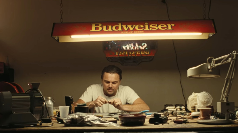 Leonardo DiCaprio as Pat/Bob making bombs in One Battle After Another