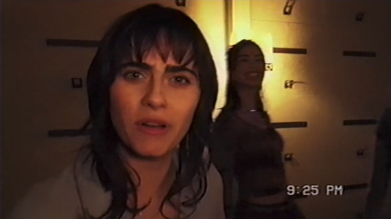 Ally Ioannides as Lily in V/H/S/99