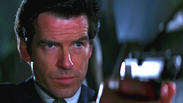 Pierce Brosnan's James Bond points his pistol in GoldenEye