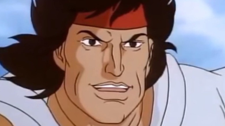 John Rambo smiling in "Rambo: The Force of Freedom"