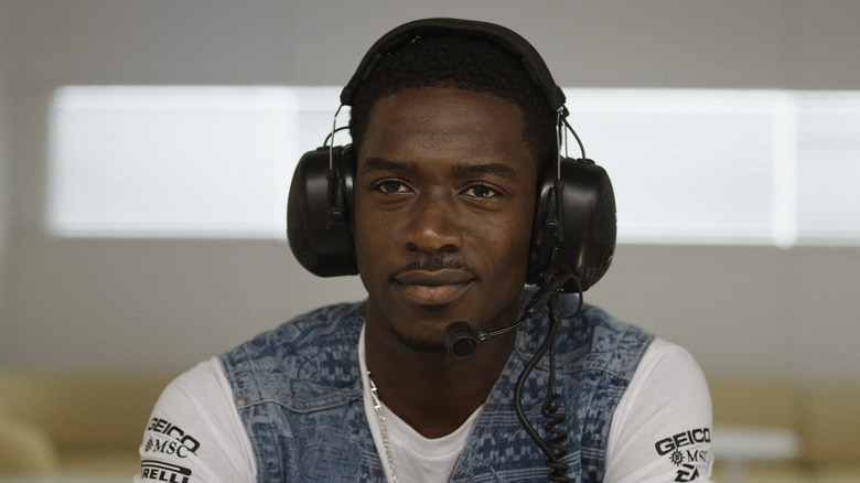 JP smiling with headphones on in F1: The Movie