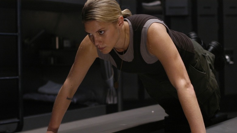 Starbuck doing push-ups in Battlestar Galactica