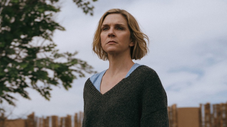 Carol looks solemn while looking ahead in Pluribus